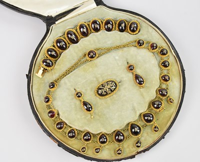 Lot 280 - An exquisite Victorian suite of garnet and...