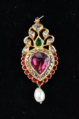 Lot 296 - An unusual yellow metal heart shaped pendant...