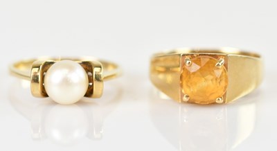 Lot 614 - A 9ct yellow gold dress ring set with a pearl,...