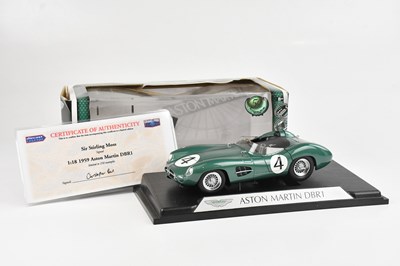 Lot 1673 - SIR STIRLING MOSS; a signed diecast model 1959...