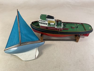 Lot 131 - A remote control tug, height 28 x width 62 x...