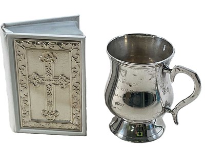 Lot 555 - A hallmarked silver fronted bible and...