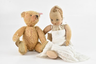 Lot 1647 - STEIFF; a teddy bear, height 29cm, and a plush...