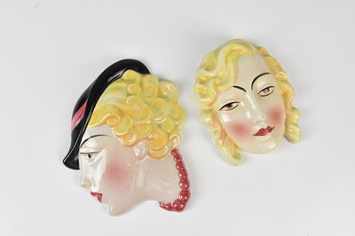 Lot 1579 - COPE & CO; an Art Deco wall mask, side profile...