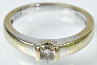 Lot 710 - An 18ct yellow and white gold diamond...