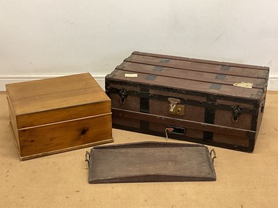 Lot 67 - A metal and wooden banded travel trunk, height...