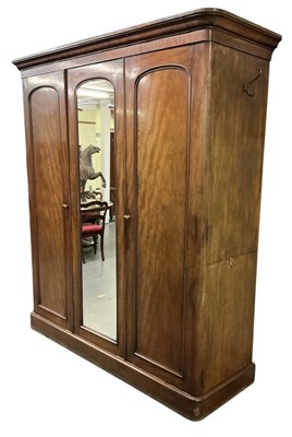 Lot 53 - A Victorian mahogany three door wardrobe, with...