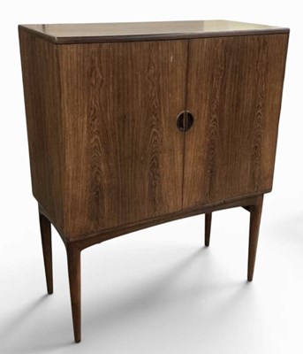Lot 33 - A 1970s Danish rosewood drinks cabinet, with...