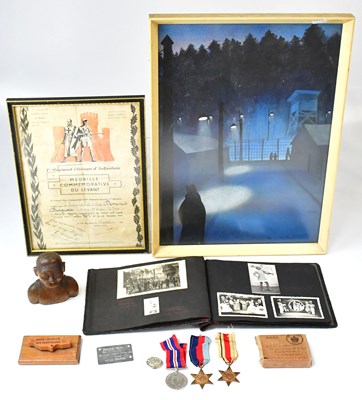 Lot 658 - A collection of medals, paintings, photograph...