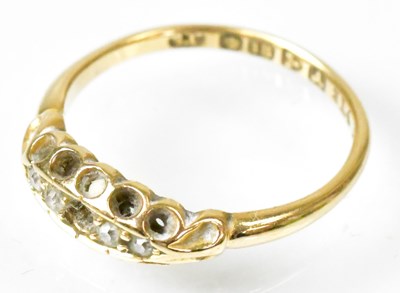 Lot 714 - A Victorian 18ct gold ring set with tiny white...
