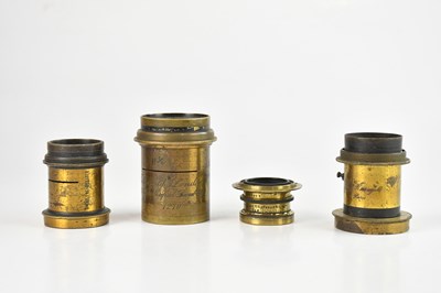 Lot 490 - A collection of four stamped brass lenses, to...