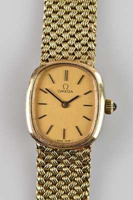 Lot 1018 - OMEGA; a lady’s 9ct gold cased wristwatch, the...