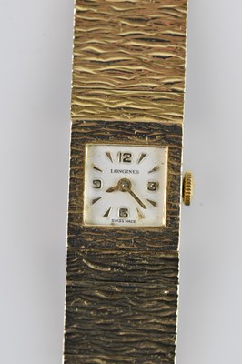 Lot 1019 - LONGINES; a lady’s 9ct gold wristwatch, the...