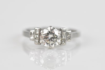 Lot 361 - A platinum Art Deco diamond solitaire dress...