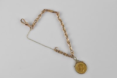 Lot 79 - A George V half sovereign, 1913, in 9ct gold...