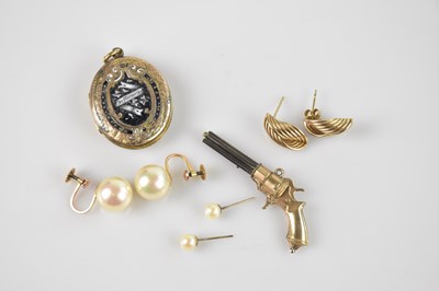 Lot 24 - A Victorian gold plated and black enamel...