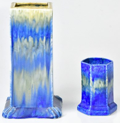 Lot 150 - RUSKIN; a square section vase with blue...