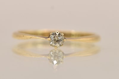 Lot 1326 - An 18ct yellow gold diamond solitaire ring,...