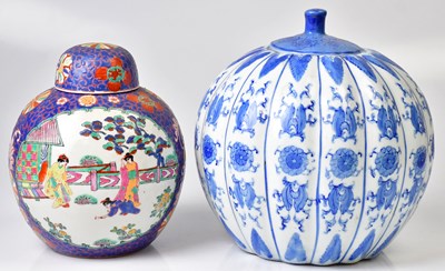 Lot 189 - A polychrome lidded jar, decorated with panels...
