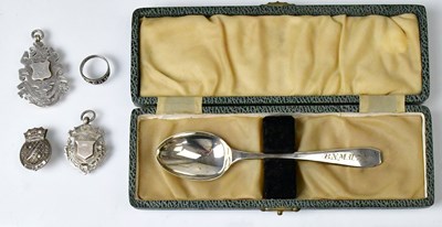 Lot 568 - Two hallmarked silver prize fobs, one blank,...
