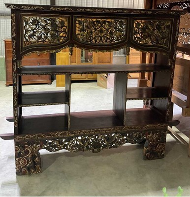 Lot 775 - An Indonesian intricately carved and painted...