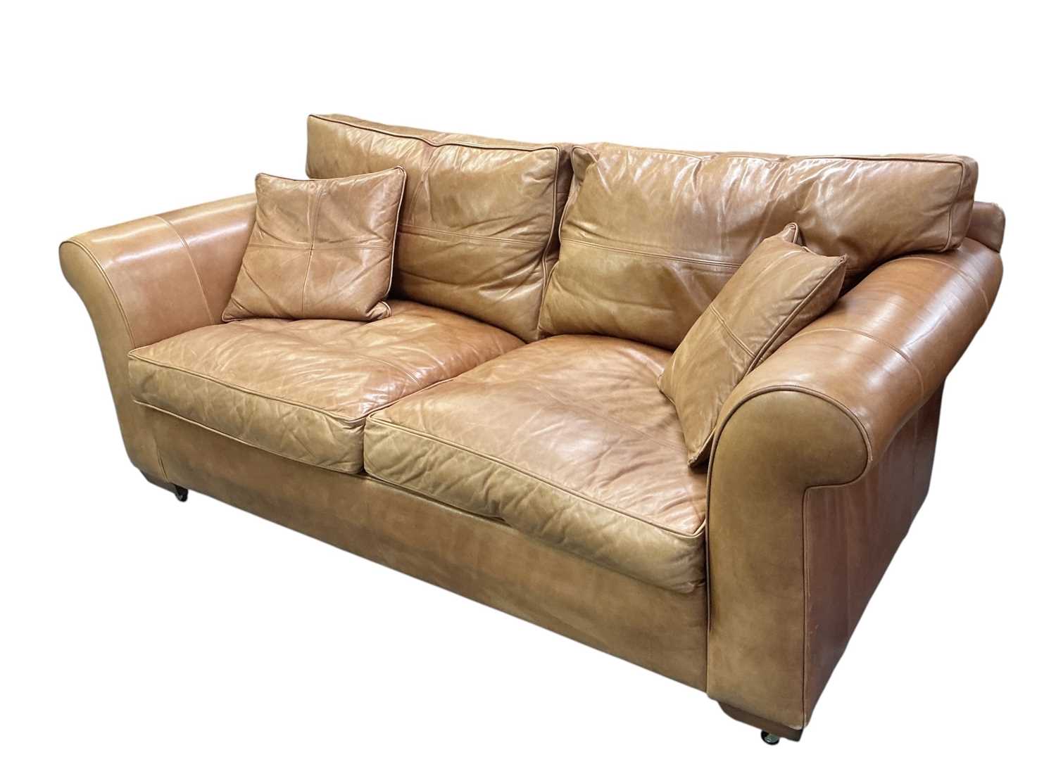 Lot 37 - DURESTA; a large tan leather upholstered...