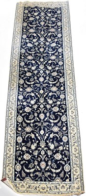 Lot 83 - A Persian Nain woollen carpet, hand-knotted in...