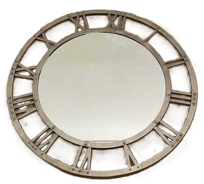 Lot 859 - A large modern circular mirror, surrounded by...