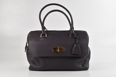 Lot 1411 - MULBERRY; a deep aubergine red pebbled grained...