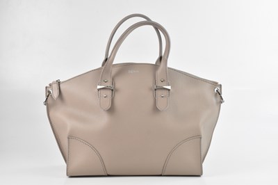 Lot 1432 - ALEXANDER MCQUEEN; a taupe pebbled calfskin...