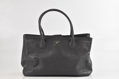 Lot 1400 - CHANEL; a dark grey grained caviar leather...