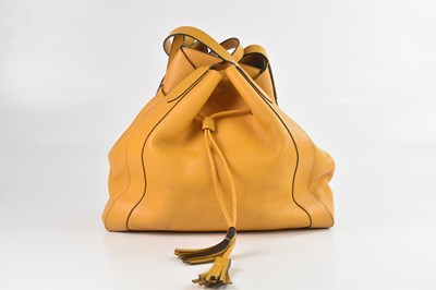 Lot 1418 - MULBERRY; a butterscotch yellow heavy grained...
