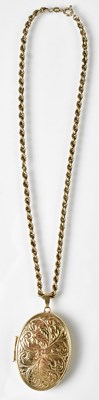 Lot 796 - A 9ct gold locket, with engraved floral...