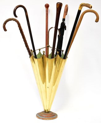 Lot 531 - A brass umbrella stand in the form of an...