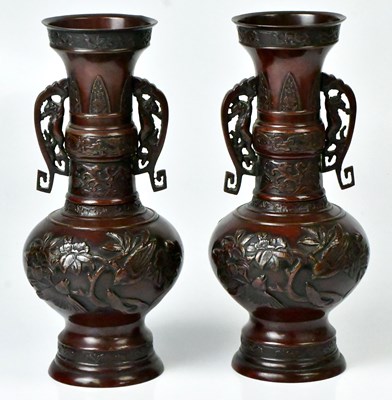 Lot 187 - A pair of Japanese bronze effect twin handled...