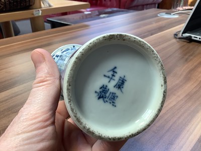 Lot 261 - A Chinese blue and white ceramic opium pillow,...