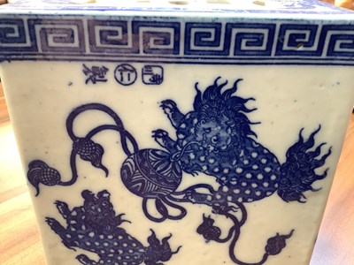 Lot 261 - A Chinese blue and white ceramic opium pillow,...