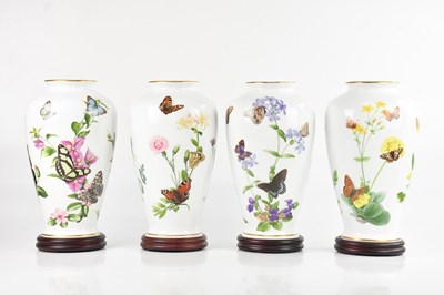Lot 1506 - FRANKLIN PORCELAIN; a set of four butterfly...