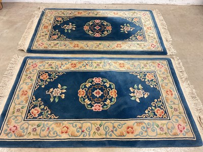 Lot 649 - A pair of Chinese superwash rugs, 170 x 92cm.