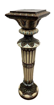 Lot 241 - A large ceramic jardiniere stand in the style...