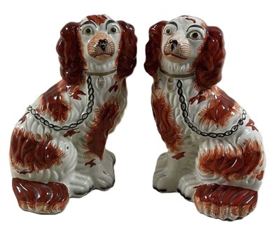 Lot 309 - A pair of Staffordshire flatback dogs, height...