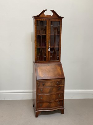 Lot 1069 - A reproduction mahogany bureau bookcase of...