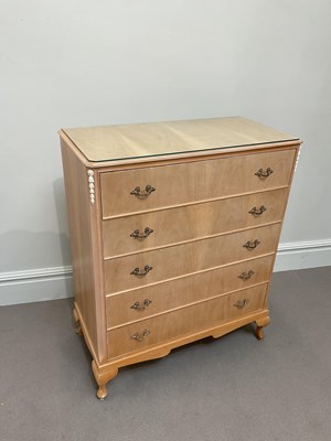 Lot 1070 - A bleached walnut chest of five drawers, on...