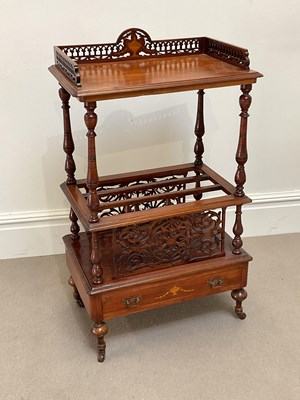 Lot 1103 - A Victorian walnut Canterbury what-not, with...