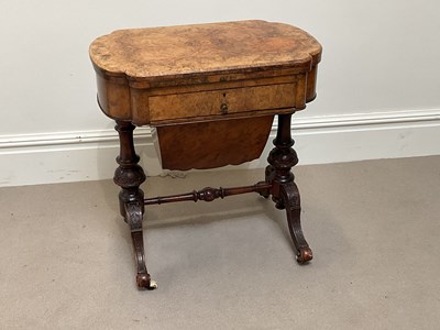 Lot 1095 - A Victorian walnut work table, with hinged top...