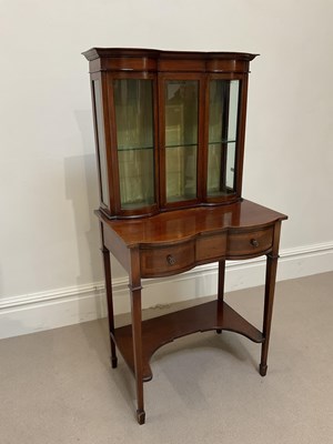 Lot 1100 - An Edwardian mahogany display table, with...