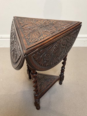 Lot 1048 - MACCLESFIELD SCHOOL OF CARVNG; a carved oak...