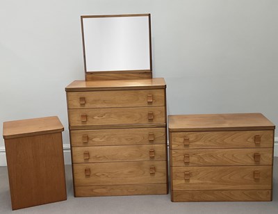 Lot 1014 - A mid century teak dressing chest, with mirror...