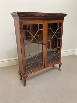 Lot 1148 - A mahogany display cabinet, with two astragal...