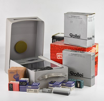 Lot 120 - ROLLEI; a P37a slide projector, boxed, with a...